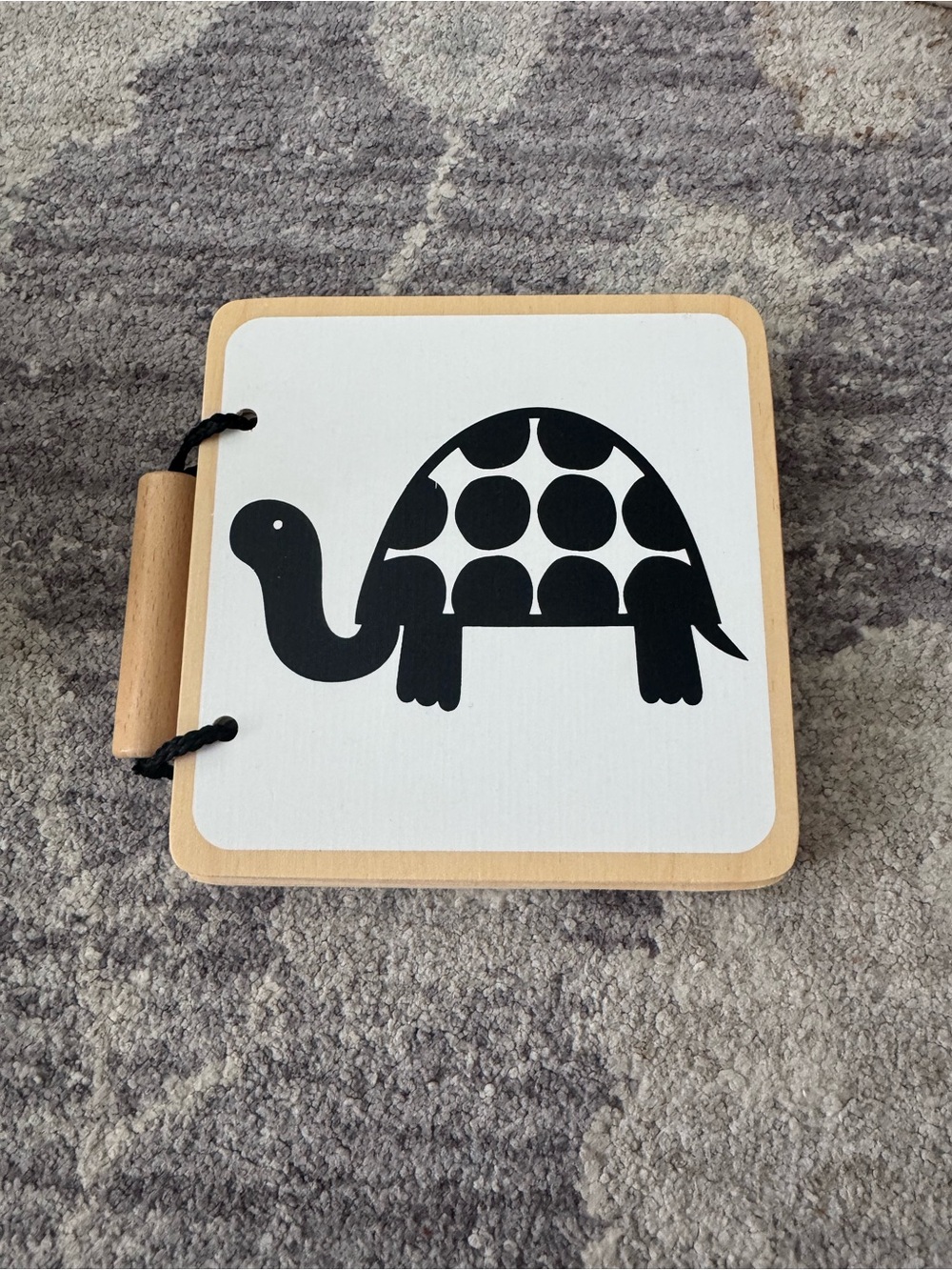 Lovevery black and white wooden book